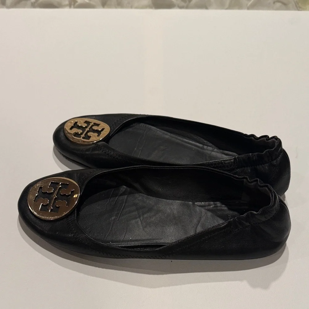 Tory Burch Black Flats with Gold Emblem